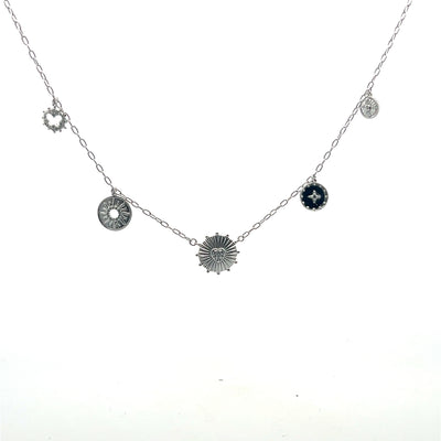 Silver necklace with circular pendants on a white background