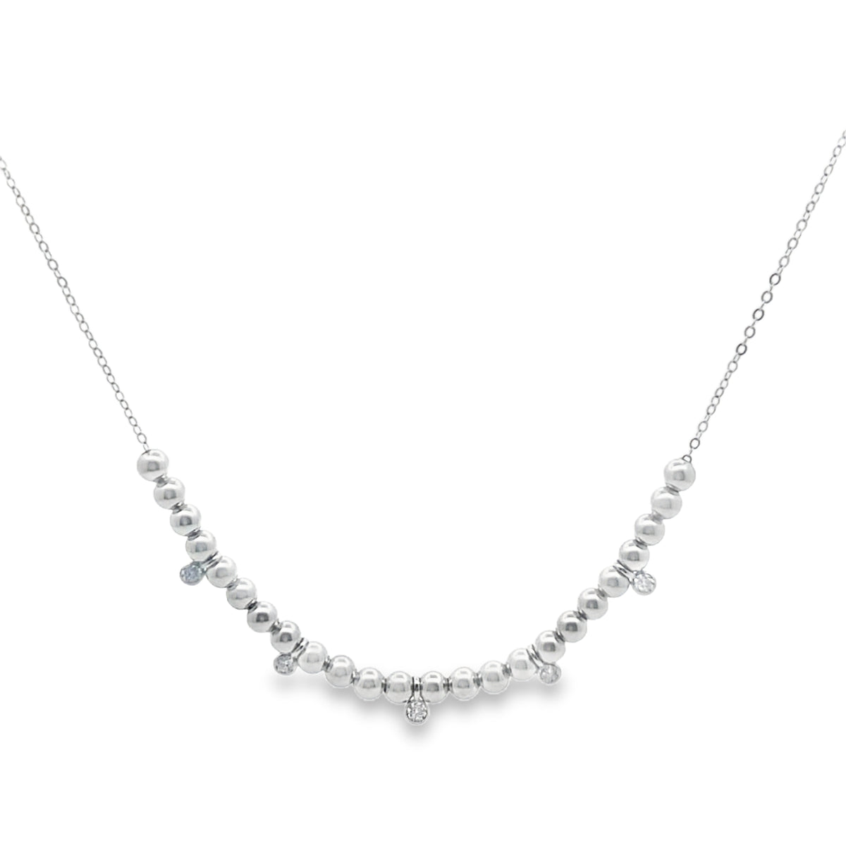 Silver necklace with small beads on a white background