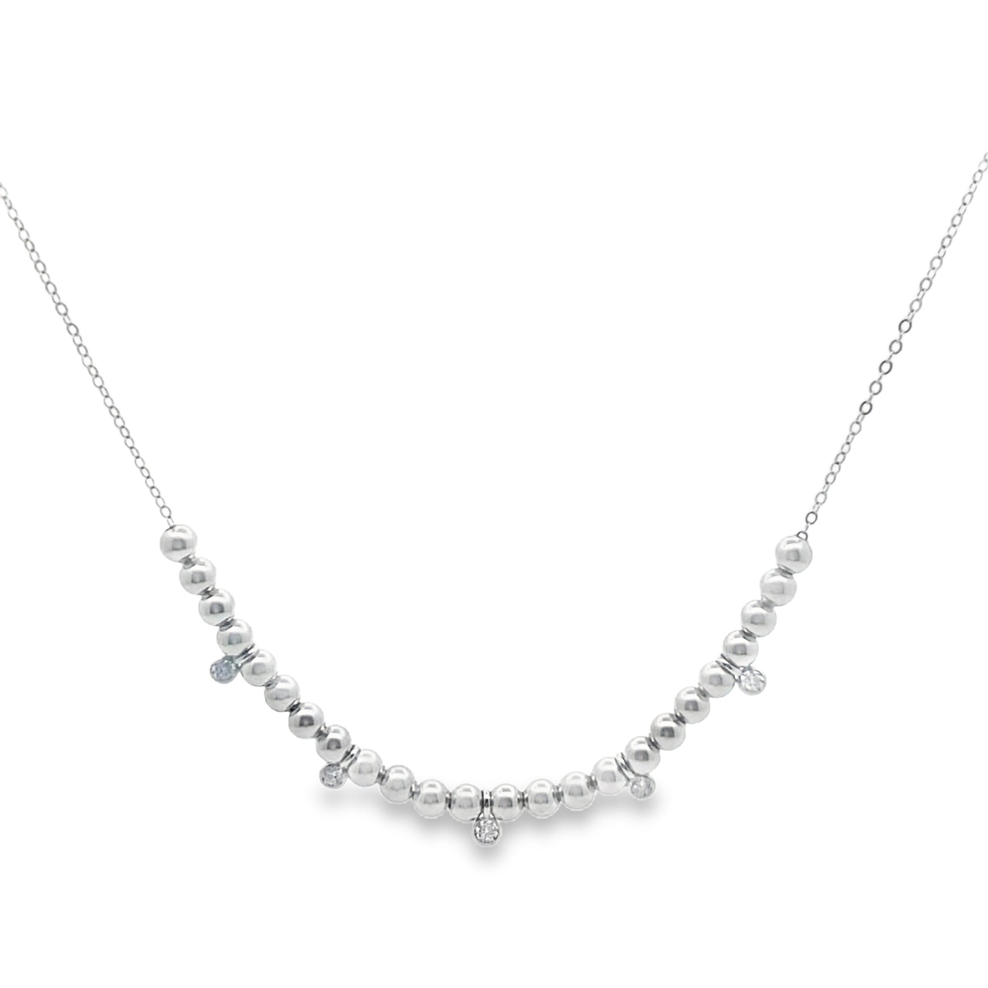 Silver necklace with small beads on a white background